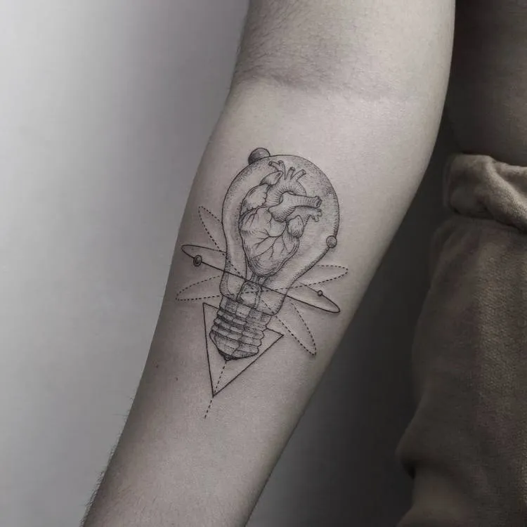 Anatomical Heart Inside Light Bulb Tattoo