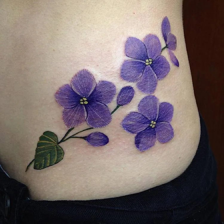 Violet Tattoo on shoulder
