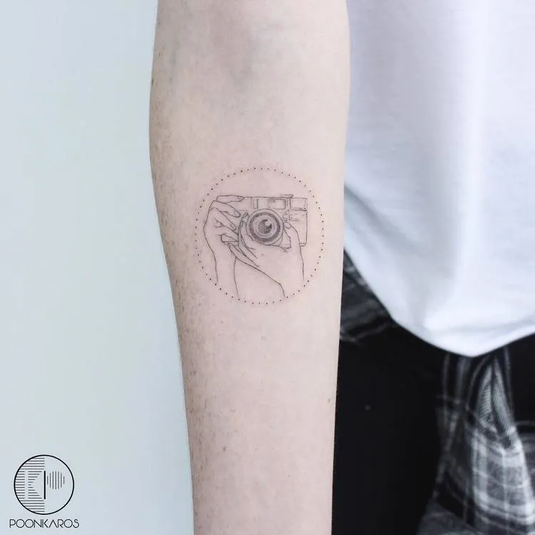 Fine Line Camera Tattoo by poonkaros