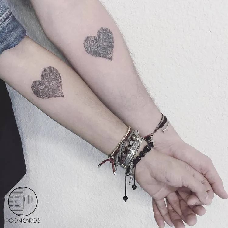 Matching Heart Tattoos by poonkaros