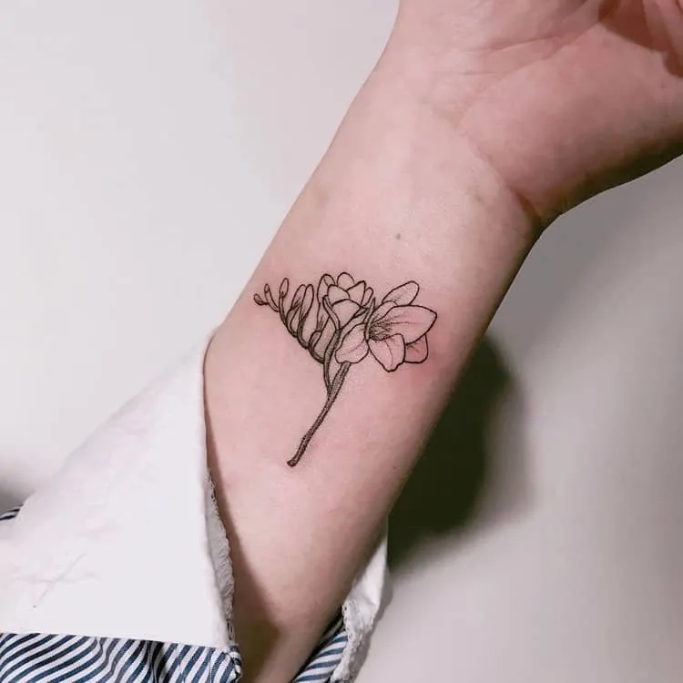 Freesia tattoo by tattooist_uno