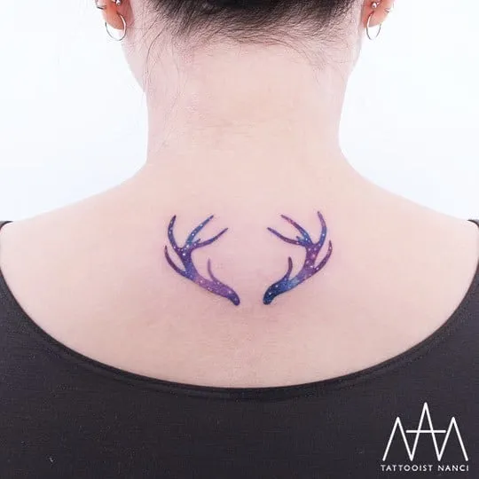 Galactic Deer Antlers Tattoo on Back by Tattooist Nanci