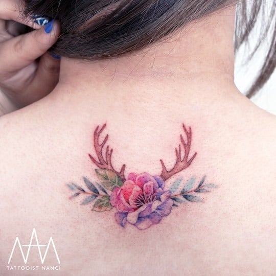 Flowers and Antlers Tattoo by Tattooist Nanci