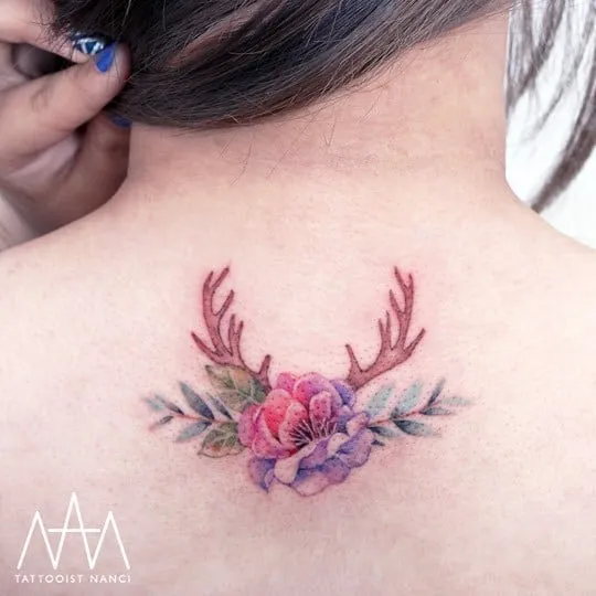 Flowers and Antlers Tattoo by Tattooist Nanci