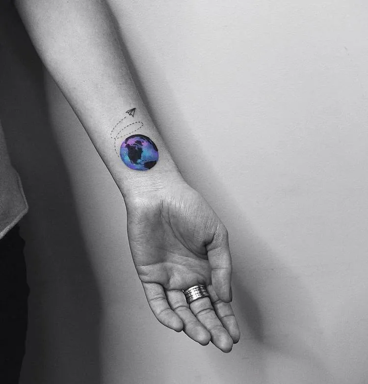Earth and Paperplane Tattoo by Vitaly Kazantsev