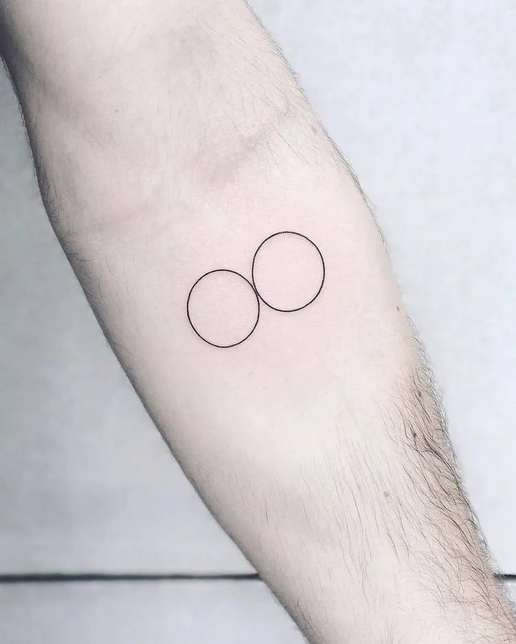 Simple Circles Tattoo by Laura Martinez