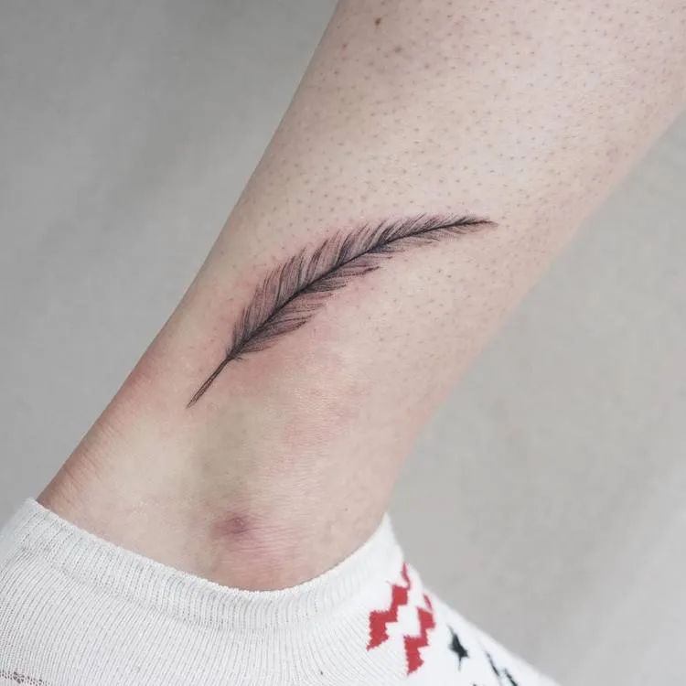 Feather Tattoo by tattooist_gaon
