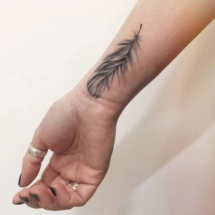 Feather Tattoo by olesia_kukuninart