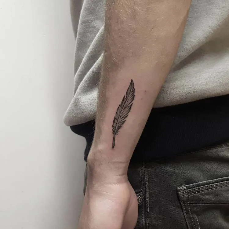 Feather Tattoo by lauramarstattoo