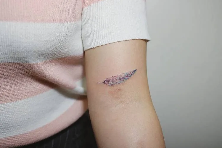 Feather Tattoo by tattooist_ty