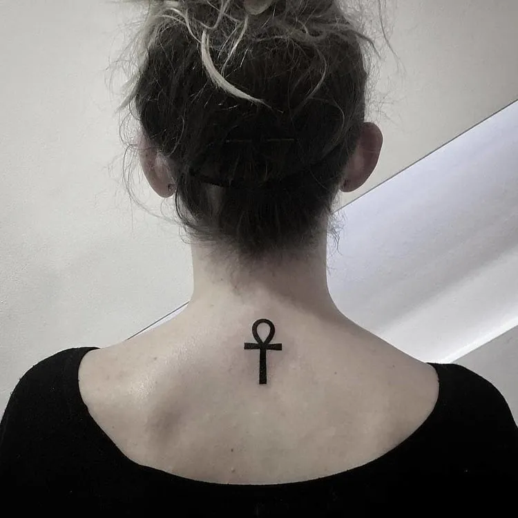 Black Ink Minimalist Ankh Tattoo by kseno.now