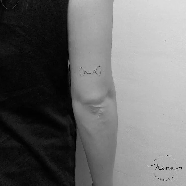 Adorable Puppy Ears Tattoo by Nena_Tattoo