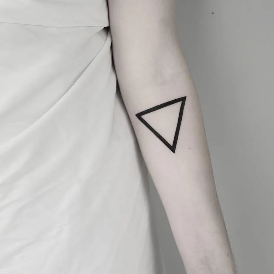Minimal Triangle Tattoo by Malvina Maria Wisniewska