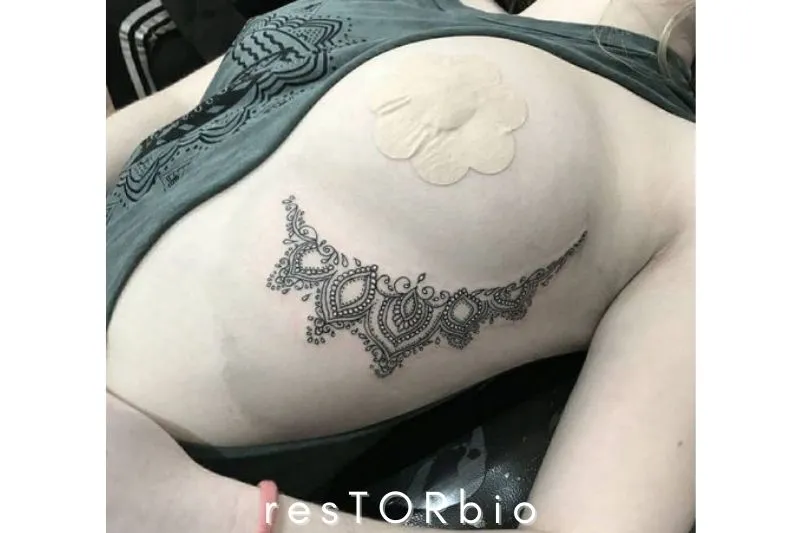 Unique Under Boob Tattoo