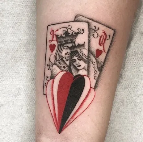 What Does Queen of Hearts Tattoo Mean, What does Queen tattoo mean, What does the two of Hearts tattoo mean, Queen of Hearts Tattoo, Minimalist Queen of Hearts Design, What does the Queen of Hearts tattoo represent, What are some common designs for a Queen of Hearts tattoo, What does the Queen of Hearts symbolize in tarot, What is the meaning of a two of hearts tattoo, What is the symbolism behind the Queen of Hearts tattoo,
