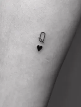 What Does Queen of Hearts Tattoo Mean, What does Queen tattoo mean, What does the two of Hearts tattoo mean, Queen of Hearts Tattoo, Minimalist Queen of Hearts Design, What does the Queen of Hearts tattoo represent, What are some common designs for a Queen of Hearts tattoo, What does the Queen of Hearts symbolize in tarot, What is the meaning of a two of hearts tattoo, What is the symbolism behind the Queen of Hearts tattoo,