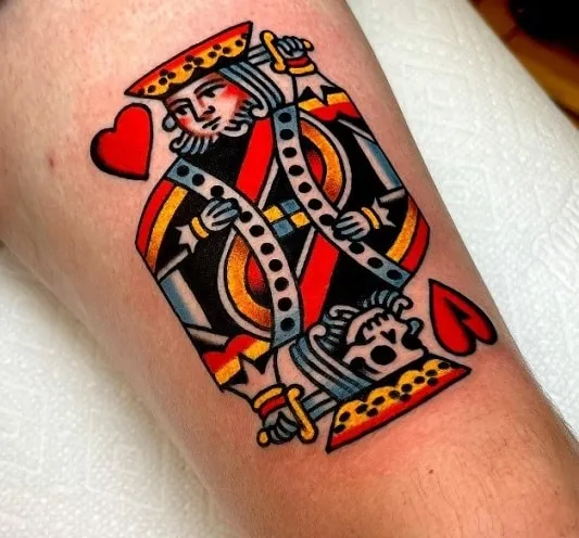 What Does Queen of Hearts Tattoo Mean, What does Queen tattoo mean, What does the two of Hearts tattoo mean, Queen of Hearts Tattoo, Minimalist Queen of Hearts Design, What does the Queen of Hearts tattoo represent, What are some common designs for a Queen of Hearts tattoo, What does the Queen of Hearts symbolize in tarot, What is the meaning of a two of hearts tattoo, What is the symbolism behind the Queen of Hearts tattoo,