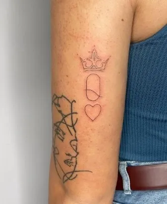 What Does Queen of Hearts Tattoo Mean, What does Queen tattoo mean, What does the two of Hearts tattoo mean, Queen of Hearts Tattoo, Minimalist Queen of Hearts Design, What does the Queen of Hearts tattoo represent, What are some common designs for a Queen of Hearts tattoo, What does the Queen of Hearts symbolize in tarot, What is the meaning of a two of hearts tattoo, What is the symbolism behind the Queen of Hearts tattoo,
