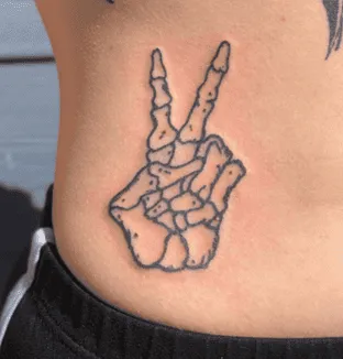 What Does A Peace Sign Tattoo Mean, Peace Sign Tattoo, Peace Sign Tattoo Ideas, Peace Sign Tattoo on fingers, Peace Sign Tattoo on Wrist,