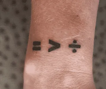 What Does A Division Sign Tattoo Mean, Division Sign Tattoo Mean, division symbol tattoo, Division Sign Tattoo, Division Sign Tattoo on wrist,