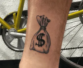 What Does A Money Sign Tattoo Mean, Money Sign Tattoo, Money Sign Tattoo ideas, Money Sign Tattoo on finger, Money Sign Tattoo on wrist, Money Sign Tattoo Mean,
