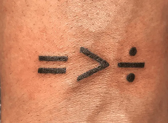 What Does A Division Sign Tattoo Mean, Division Sign Tattoo Mean, division symbol tattoo, Division Sign Tattoo, Division Sign Tattoo on wrist,