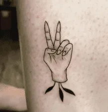 What Does A Peace Sign Tattoo Mean, Peace Sign Tattoo, Peace Sign Tattoo Ideas, Peace Sign Tattoo on fingers, Peace Sign Tattoo on Wrist,