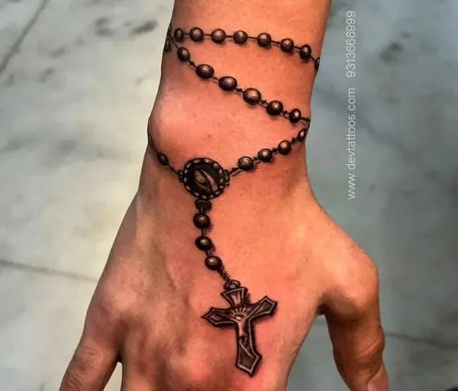 Cross Tattoo on Hand Meaning