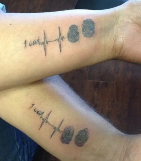 Fingerprint or Heartbeat Lines Couple Tattoo 2