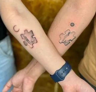 Intertwined Puzzle Pieces Couple Tattoo 2