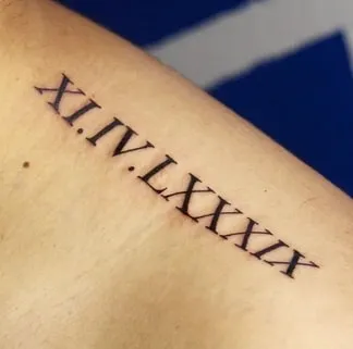Roman Numeral Tattoo shoulder