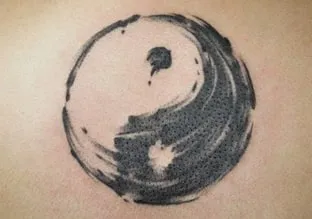 Swirling brushstrokes Yin Yang Tattoo