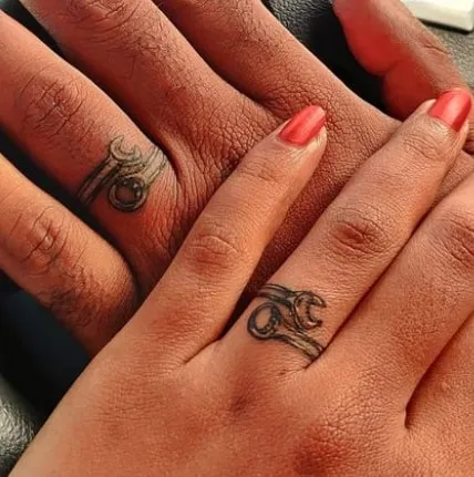 Tiny Shared Symbols Couple Tattoo