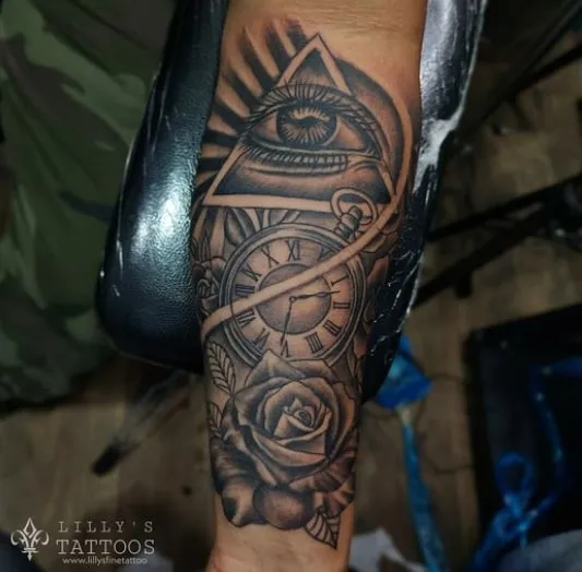 black and white triangle eye tattoo