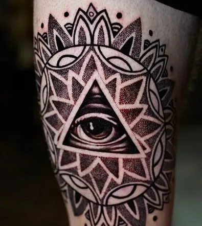 dotwork triangle eye tattoo