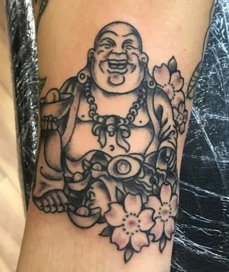 laughing buddha tattoo idea