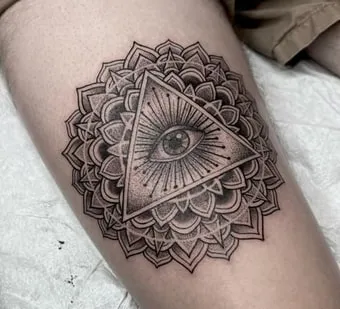 triangle eye tattoo with mandala