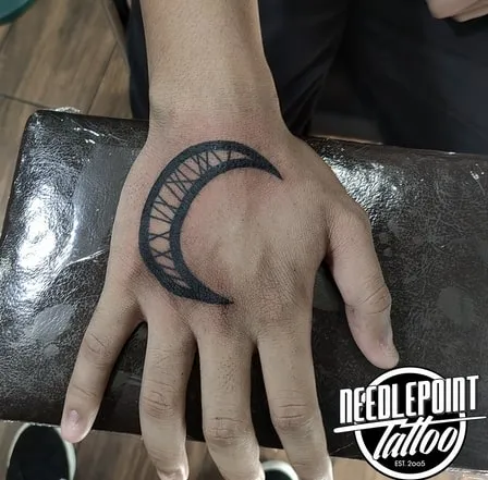 Placement and Visibility of a Half Moon Tattoo for Men