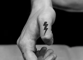 Single Needle Lightning Bolt Tattoo