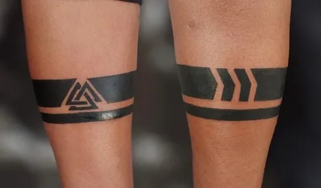arrow black band on arm tattoo idea