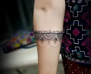 mandala black band on arm tattoo idea 2