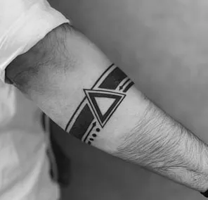 thin and broad black band on arm tattoo idea