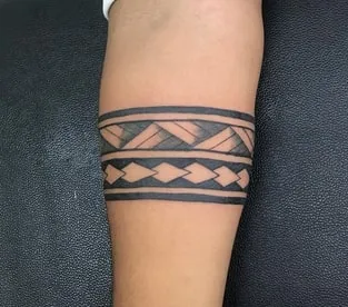 detailed geometric black band on arm tattoo idea