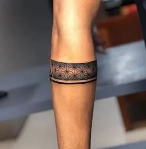black band on arm tattoo meaning