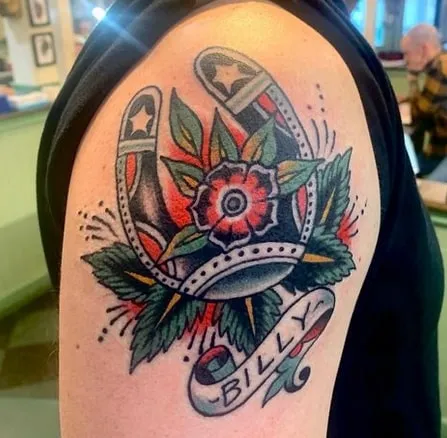 horseshoe tattoo design idea shoulder