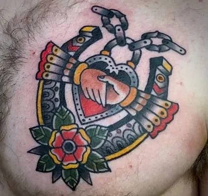 horseshoe tattoo design idea chest