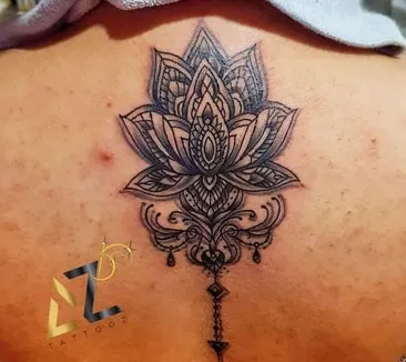 geometric lotus tattoo design idea