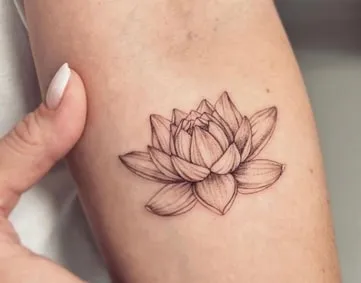 minimal lotus tattoo design idea