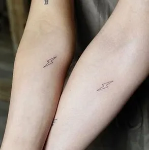 matching lightning bolt couple tattoo