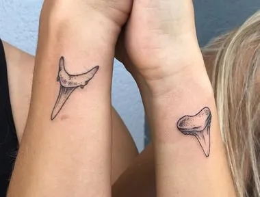 couple shark tooth tattoo meaning